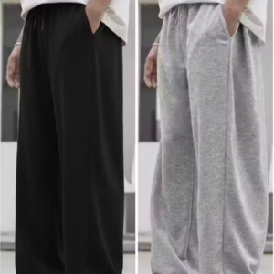 Trendy loose fit trousers made of smooth and super stretcheable, breathable fabric for all seasons wear.